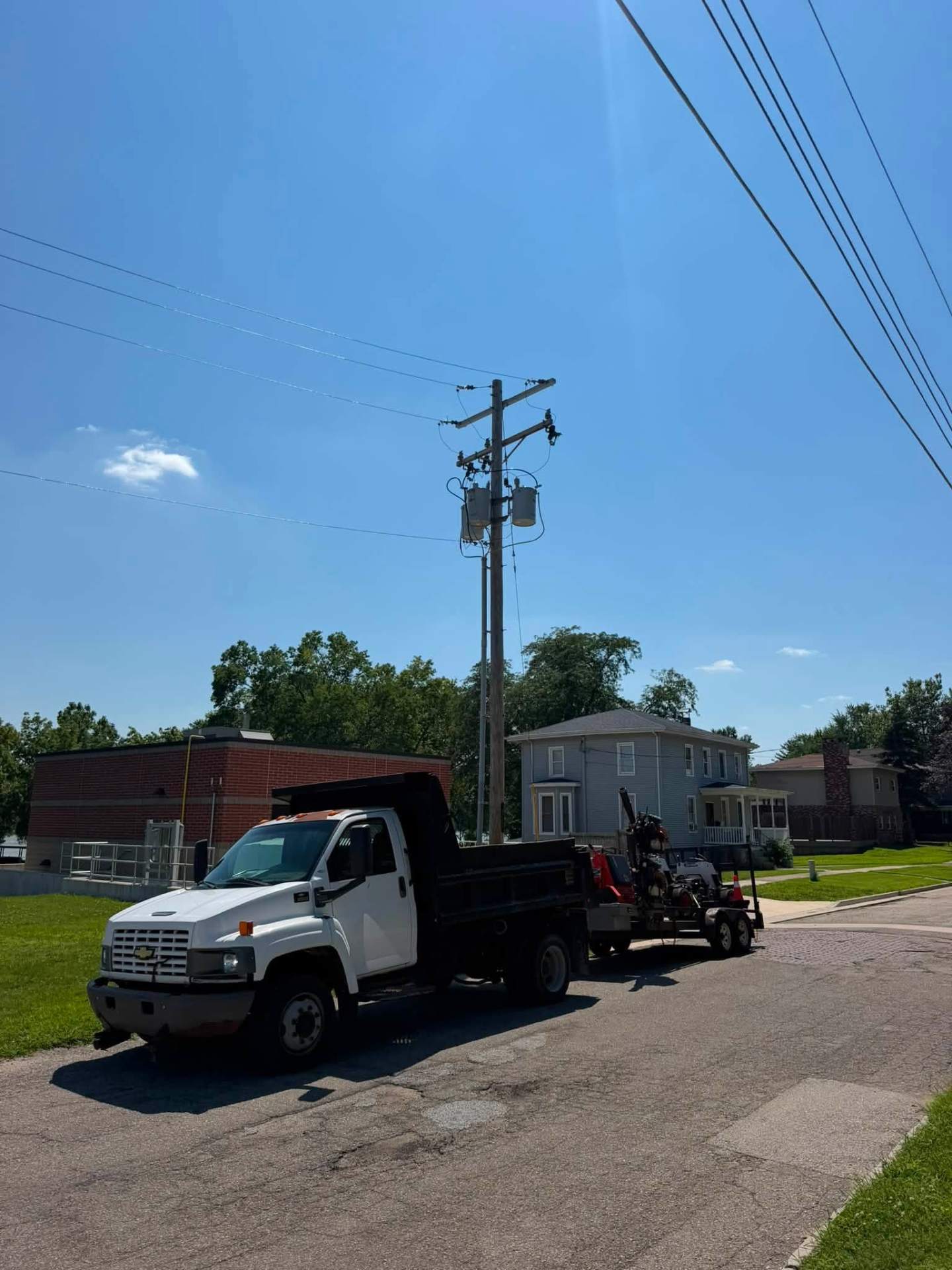 Lowe's Outdoor Services crew truck ready for lawn, landscaping, and junk removal jobs